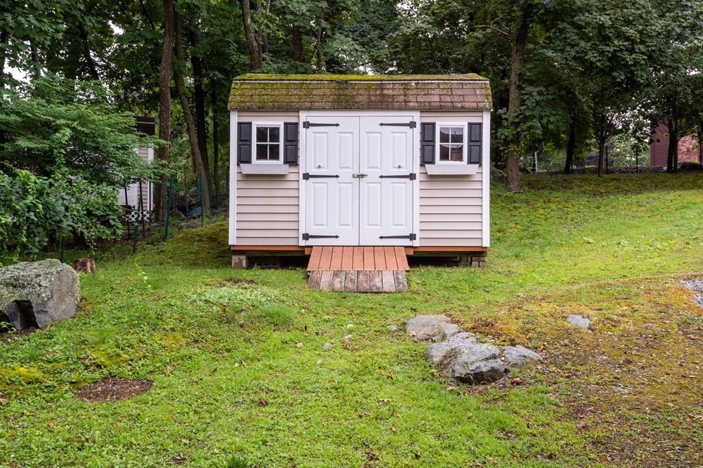 135 Spring Street Stoneham, MA 02180 - Photo 42 of 42 a view of a house with a yard