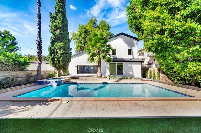 a bathroom with a shower and a window