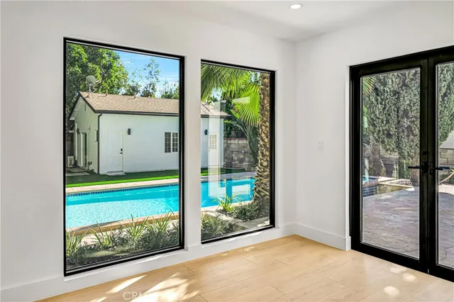 a bathroom with a double vanity sink and mirror