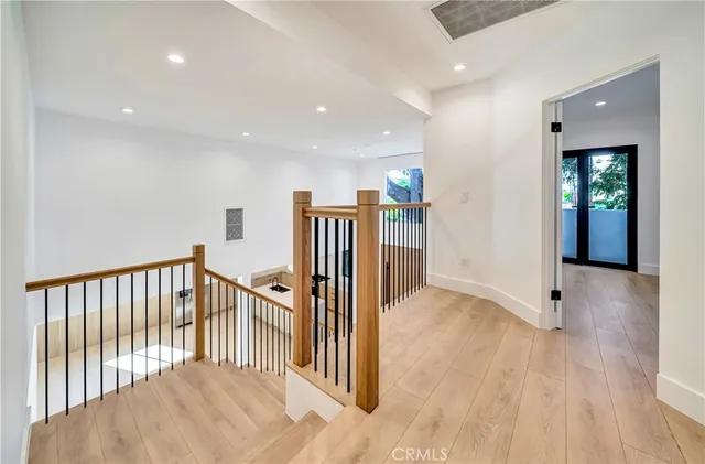 a view of a back yard from a corridor