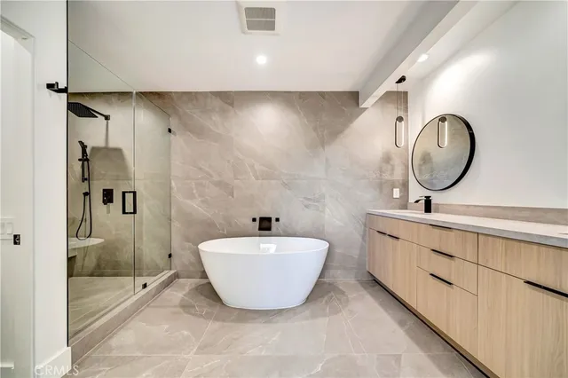 a view of kitchen with stainless steel appliances refrigerator oven and stove