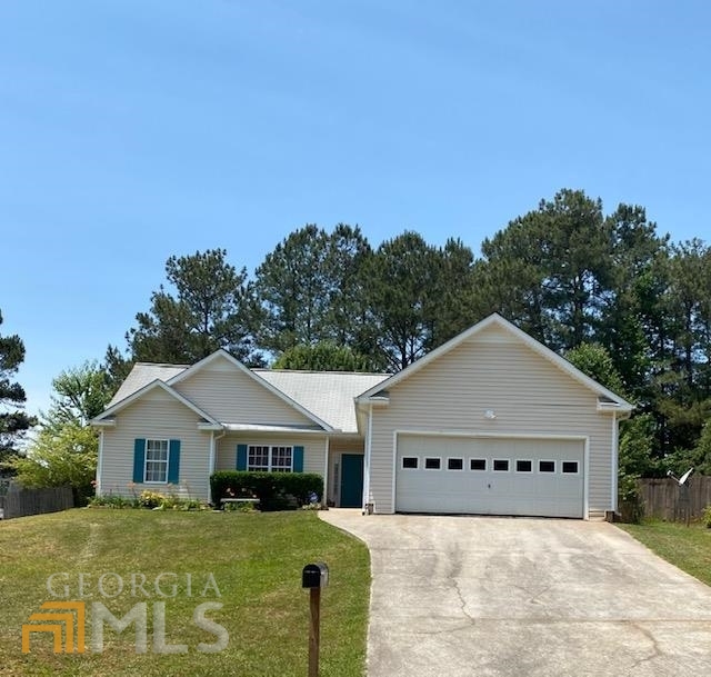 126 Villa Rosa Ridge Temple, GA 30179 - Photo 1 of 1 a front view of a house with a yard and garage