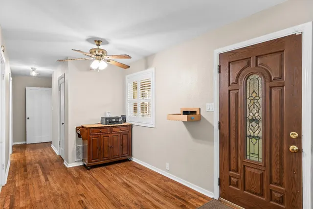 a view of an empty room with a bathroom
