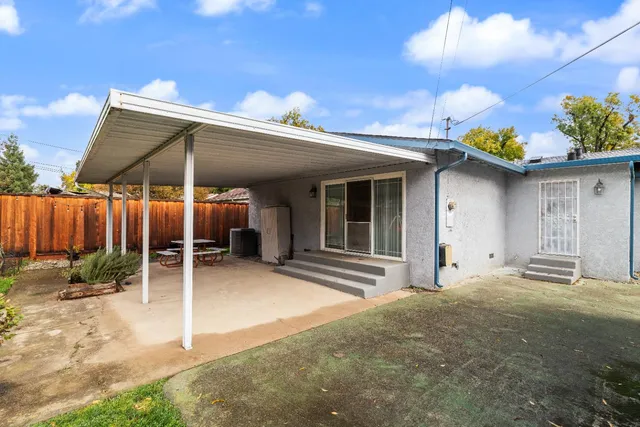a view of a house with a patio