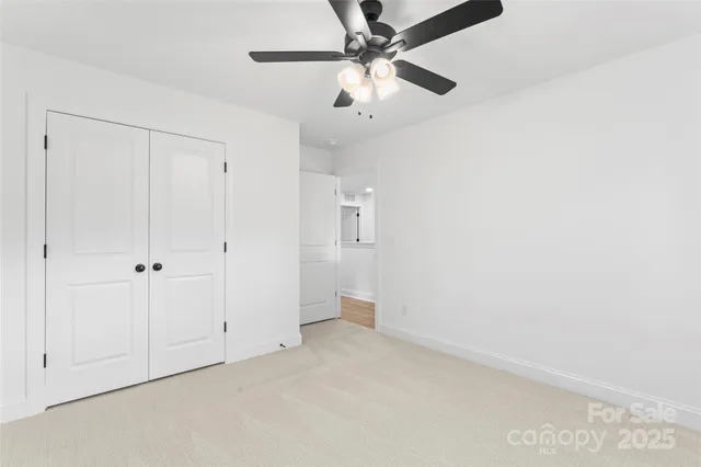 an empty room with fan