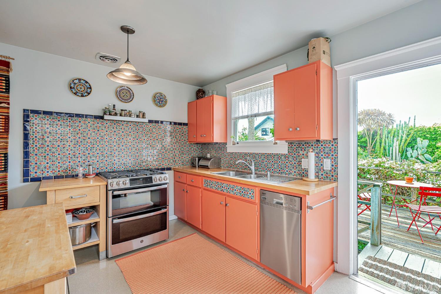 2314 Edwards Street Berkeley, CA 94702 - Photo 24 of 39 a kitchen with stainless steel appliances granite countertop a stove a sink and a microwave