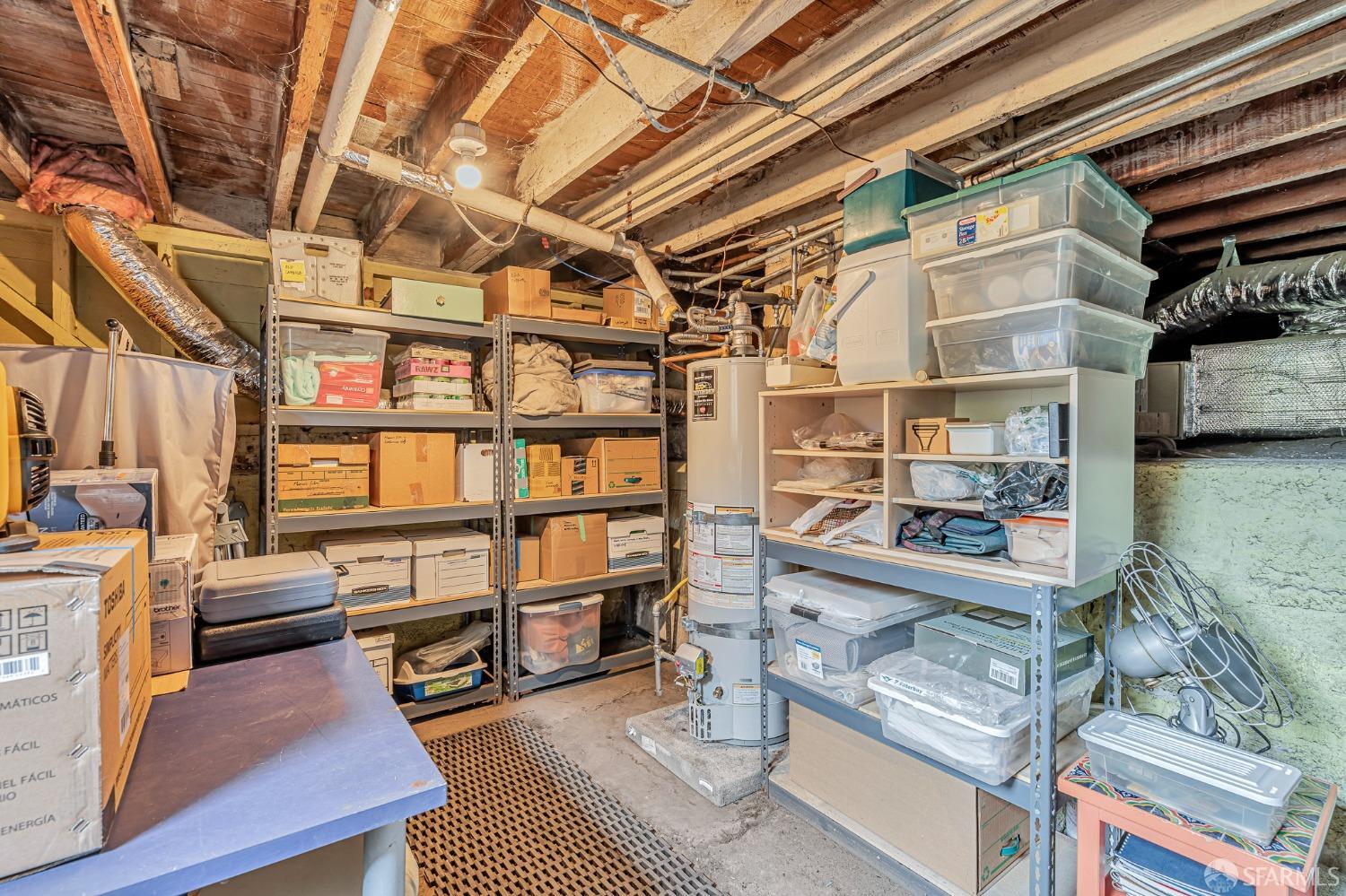 2314 Edwards Street Berkeley, CA 94702 - Photo 36 of 39 a room with wooden cabinets and furniture
