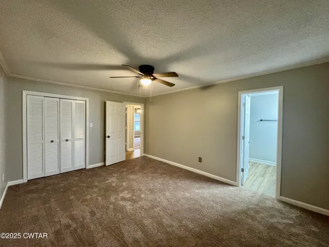 a bathroom with a double vanity sink mirror and shower