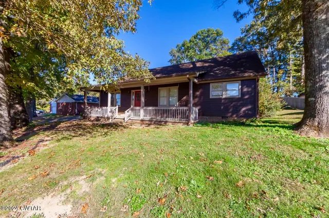a house view with a garden space