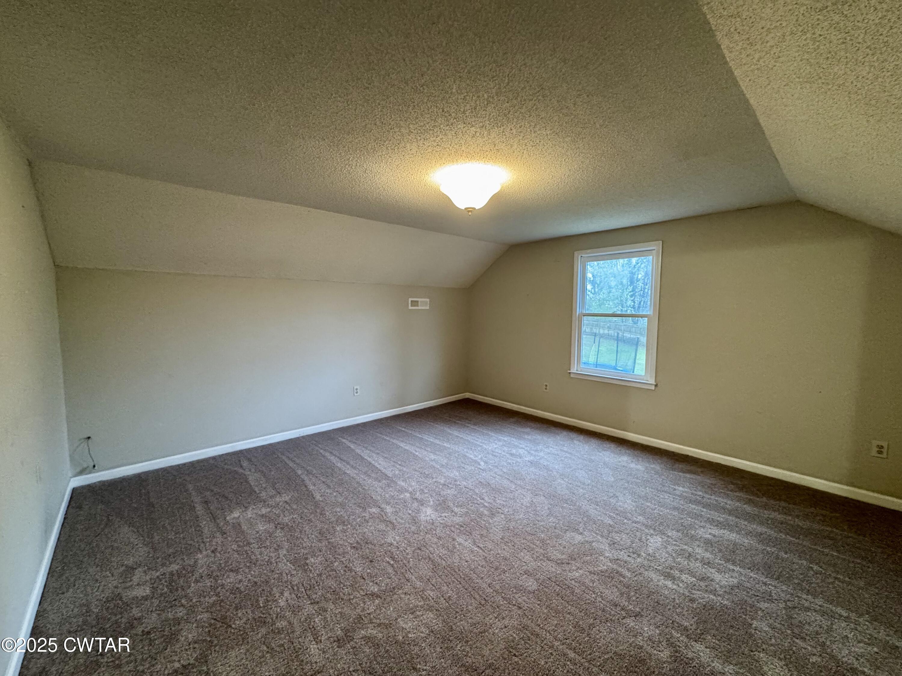 212 Fox Run Drive Jackson, TN 38305 - Photo 25 of 32 an empty room with a window