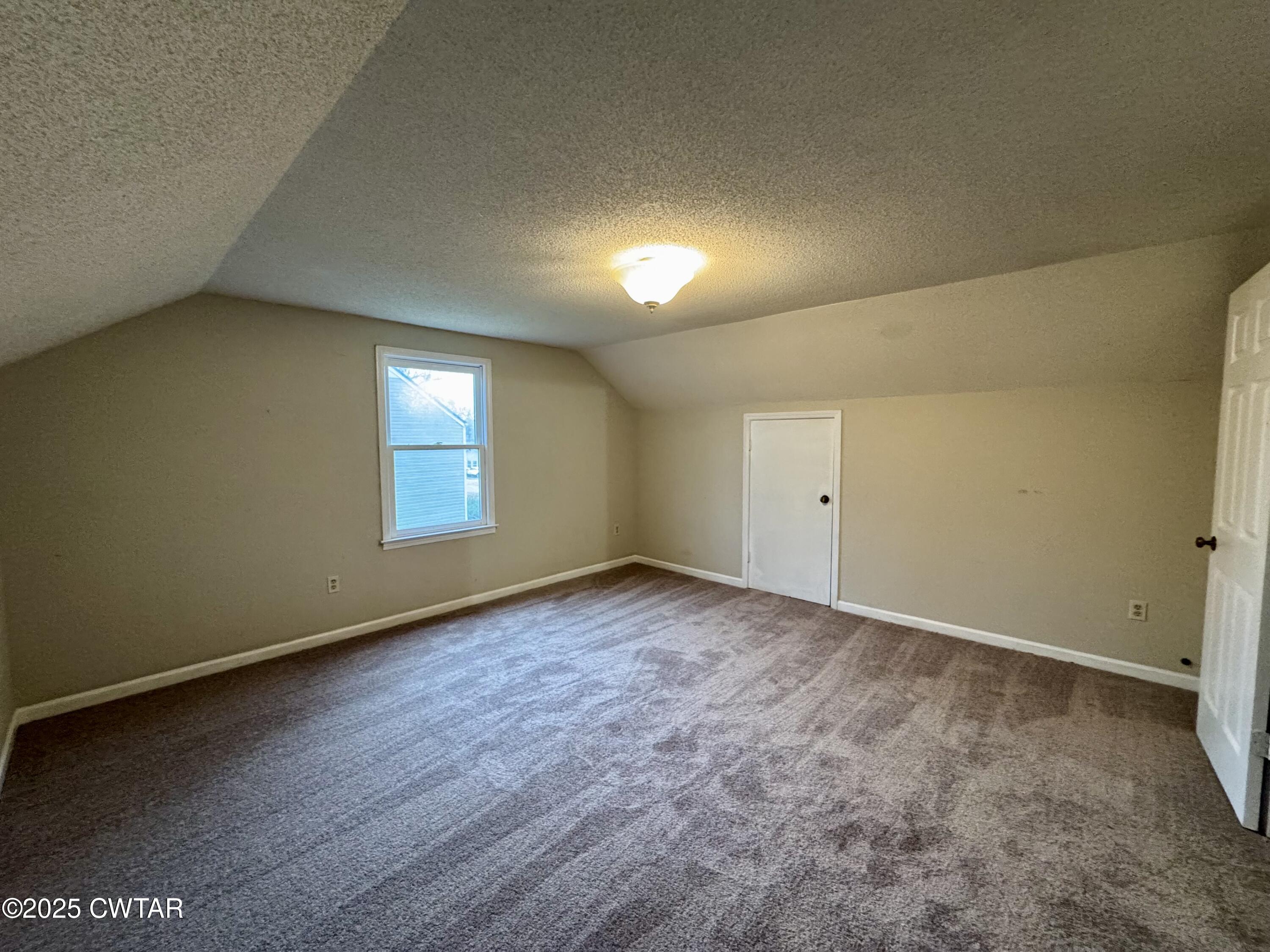 212 Fox Run Drive Jackson, TN 38305 - Photo 26 of 32 an empty room with windows