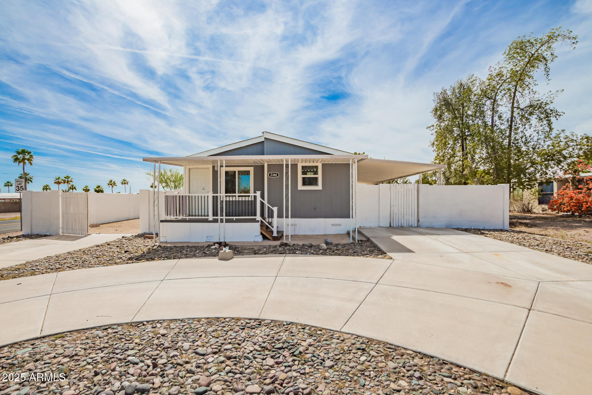 2388 South Vista Road Apache Junction, AZ 85119 - Photo 1 of 34 a front view of a house with a space