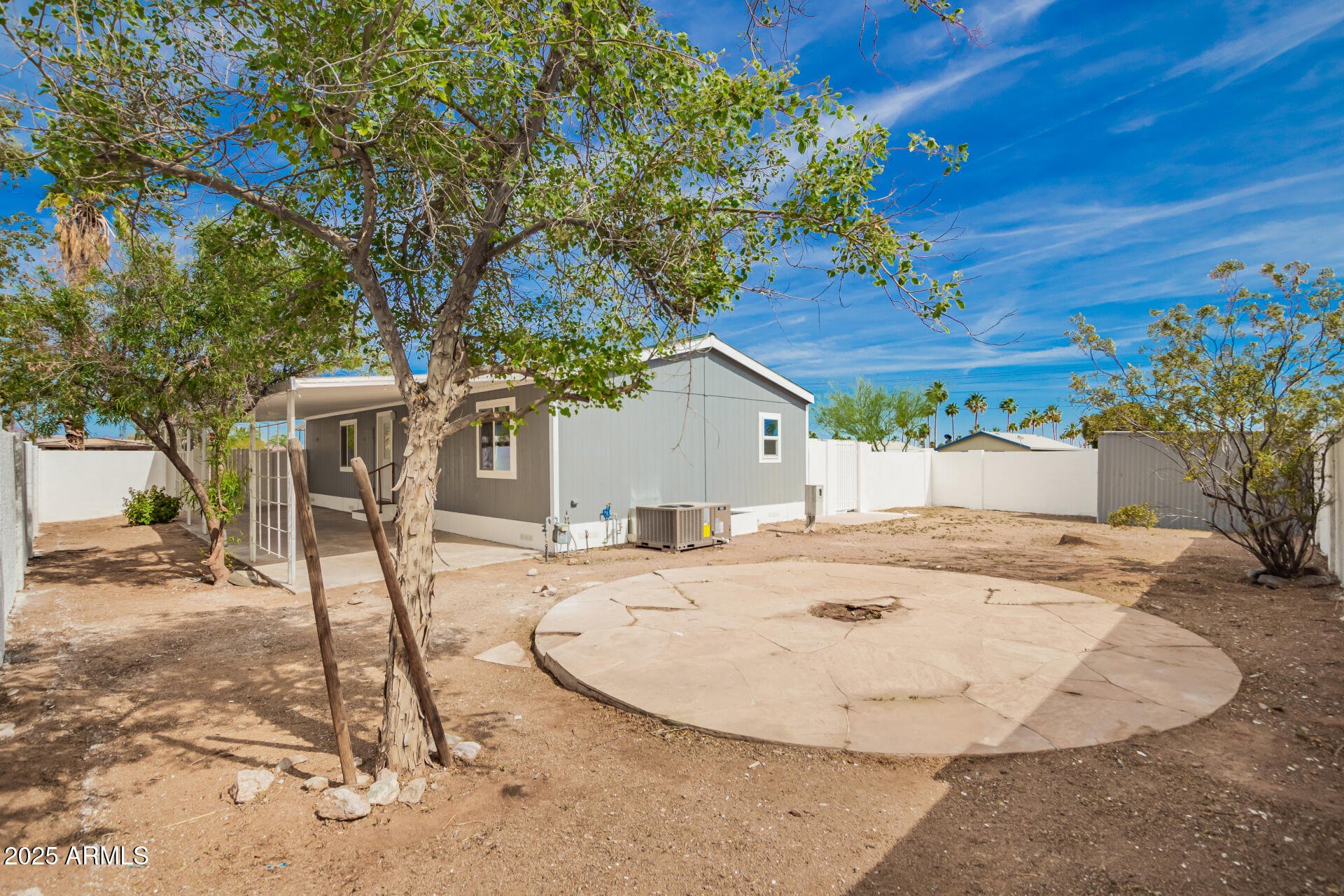 2388 South Vista Road Apache Junction, AZ 85119 - Photo 28 of 34 a view of a backyard with a patio
