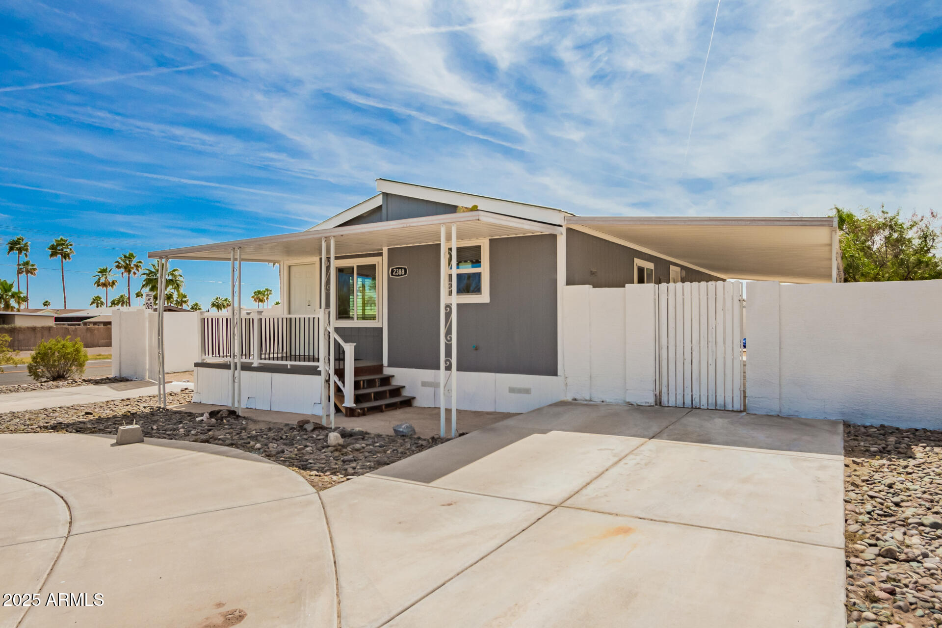 2388 South Vista Road Apache Junction, AZ 85119 - Photo 6 of 34 a front view of a house with backyard