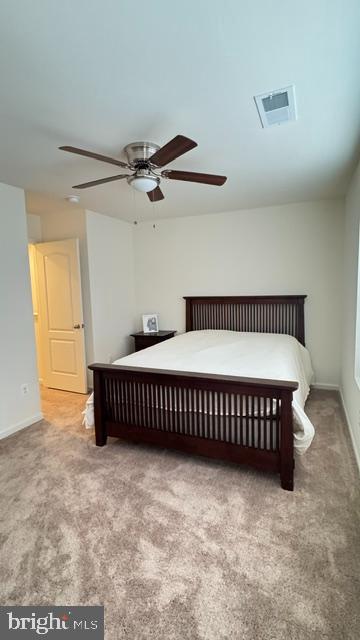 65 Chesterfield Road East Berlin, PA 17316 - Photo 19 of 32 a bedroom with a bed and a chandelier
