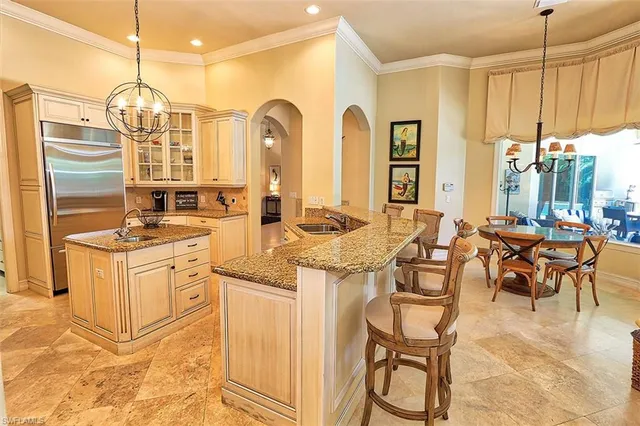 a very nice looking kitchen with a large window