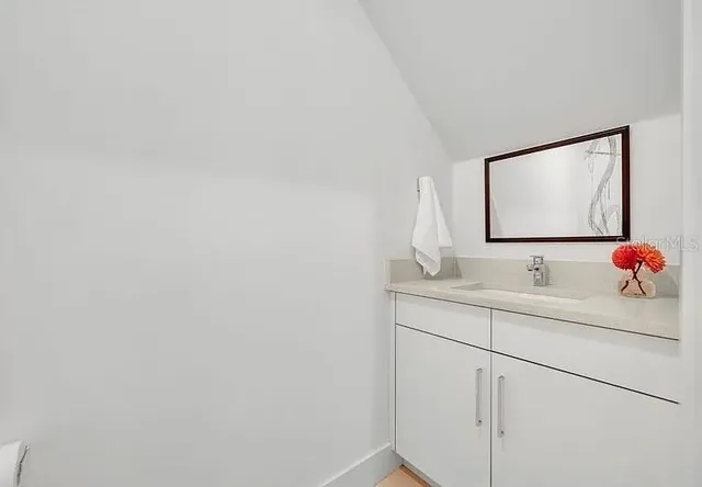 a view of a garden with pathway