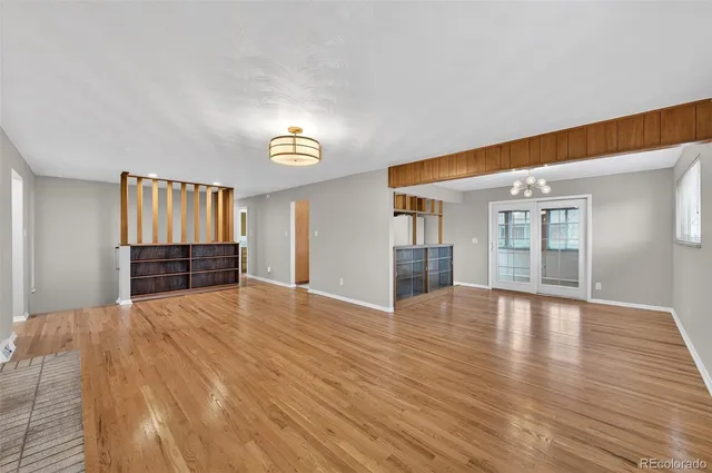 a room with a bed and a window