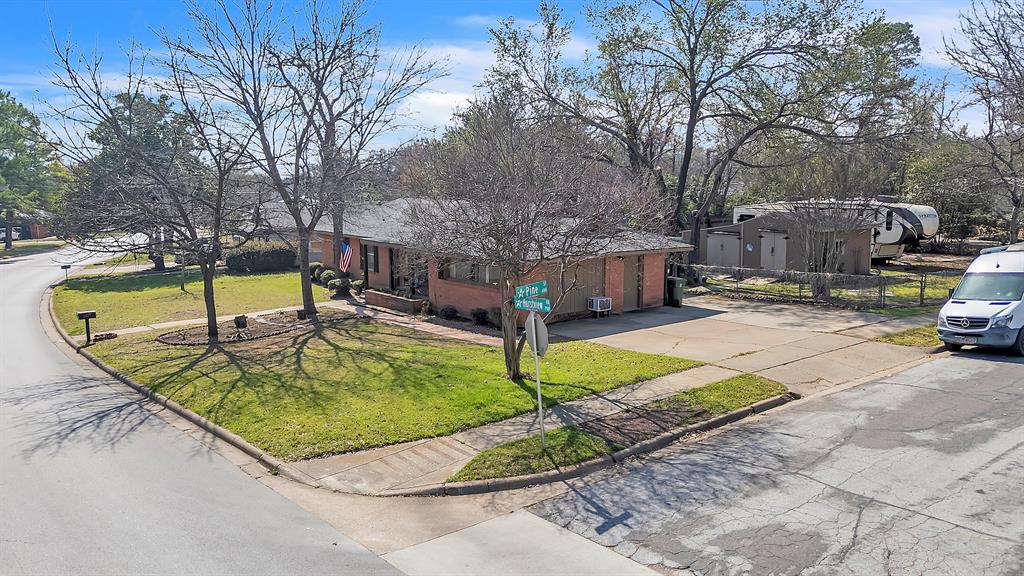 709 Hurstview Drive Hurst, TX 76053 - Photo 4 of 28 a view of a swimming pool with a patio