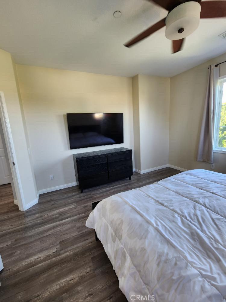 11040 Encanto Way El Monte, CA 91731 - Photo 12 of 17 a bedroom with a bed and a flat screen tv