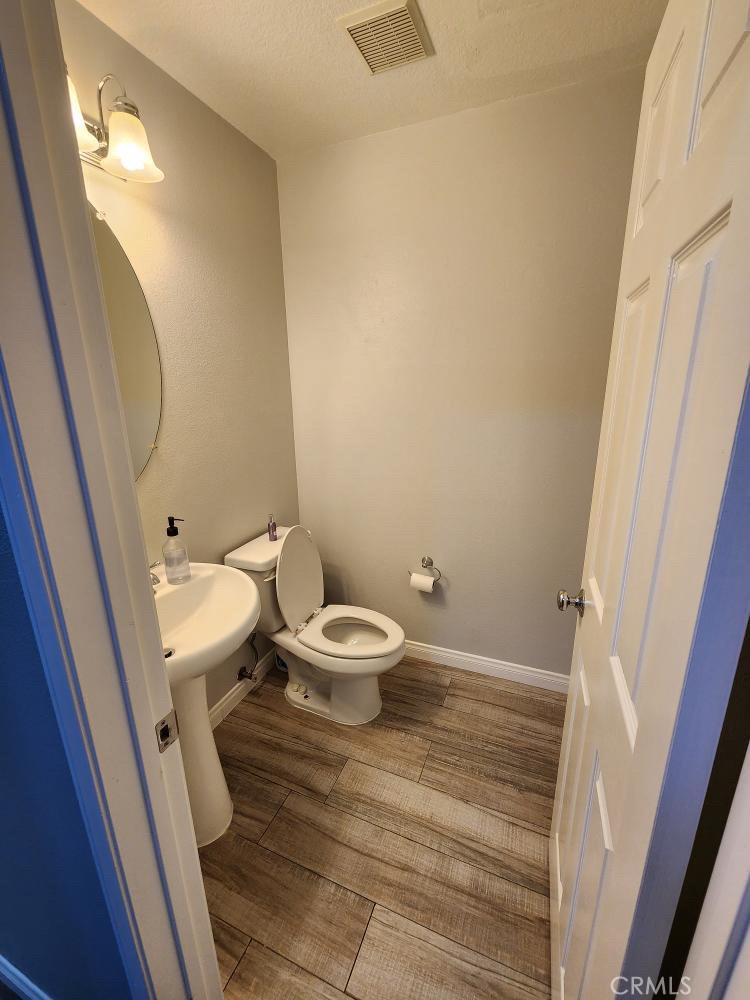 11040 Encanto Way El Monte, CA 91731 - Photo 13 of 17 a bathroom with a toilet and a sink