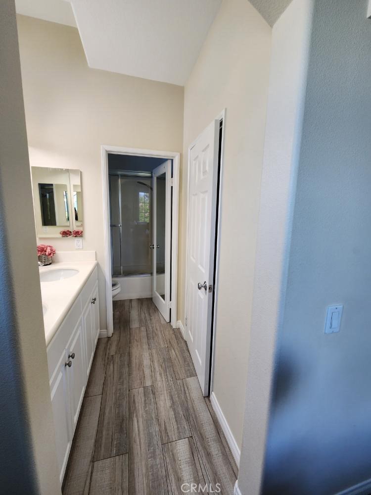 11040 Encanto Way El Monte, CA 91731 - Photo 14 of 17 a bathroom with a sink and a mirror