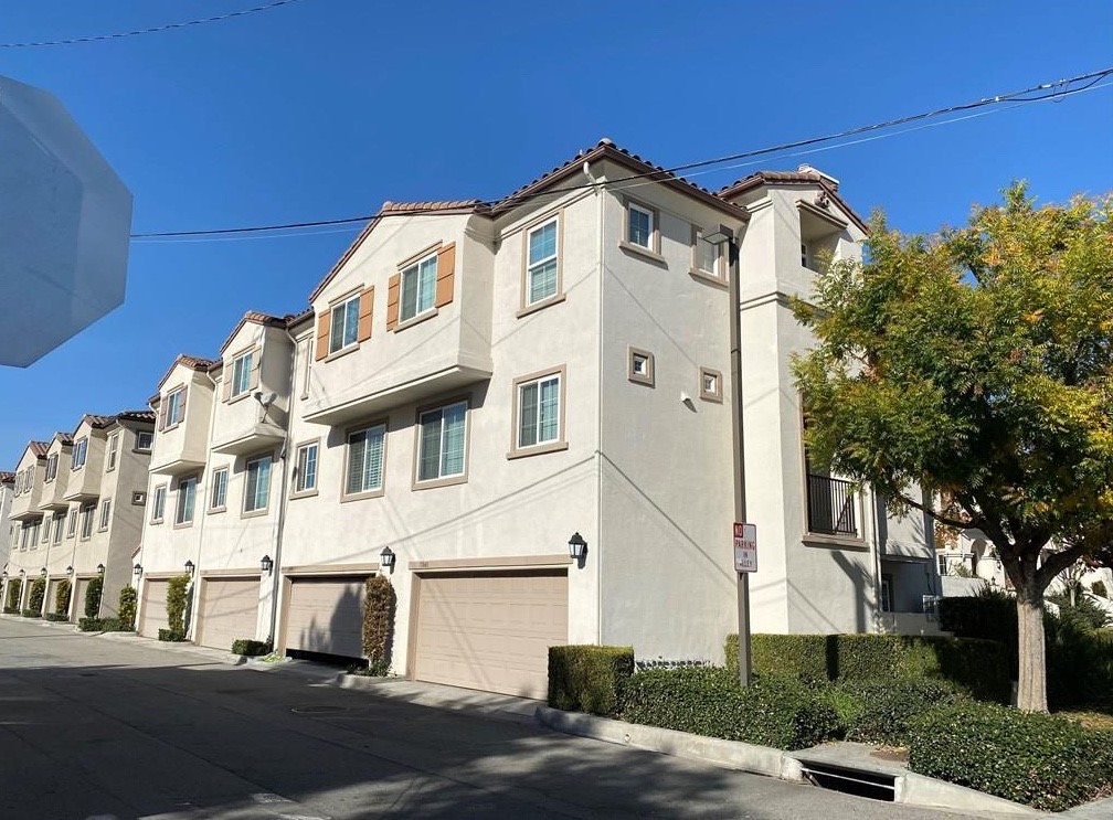 11040 Encanto Way El Monte, CA 91731 - Photo 17 of 17 a front view of a building with a street
