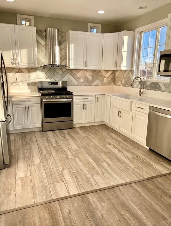 11040 Encanto Way El Monte, CA 91731 - Photo 2 of 17 a kitchen with stainless steel appliances granite countertop a sink stove and cabinets