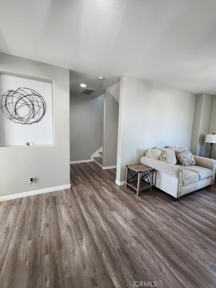 11040 Encanto Way El Monte, CA 91731 - Photo 6 of 17 a bedroom with a bed and a table