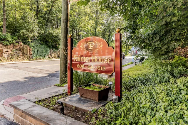 a sign on the side of the road