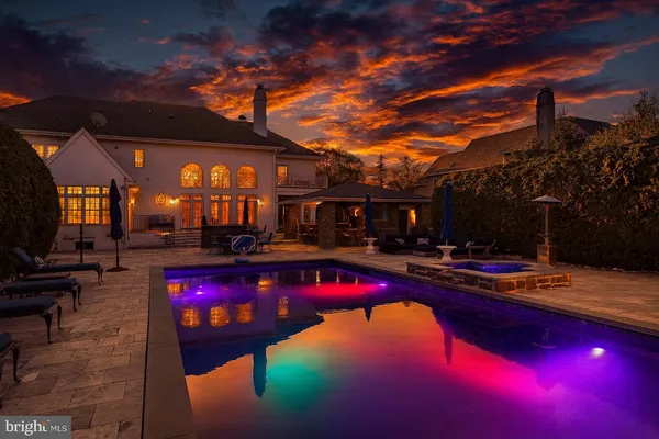 a view of swimming pool outdoor seating