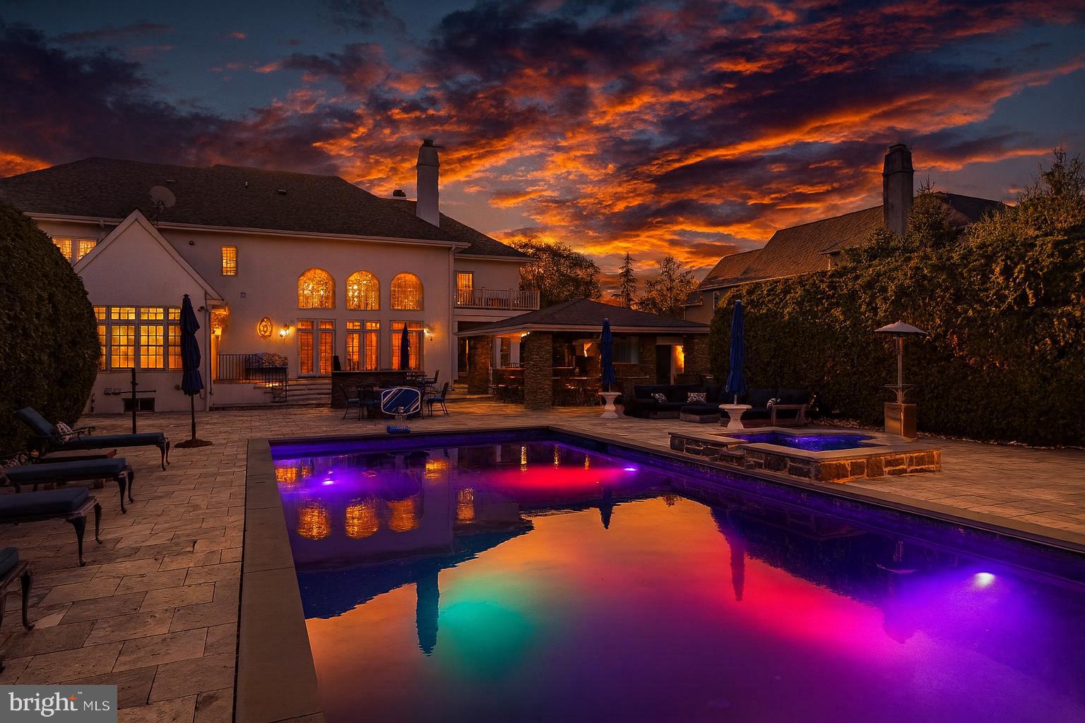 a view of swimming pool outdoor seating