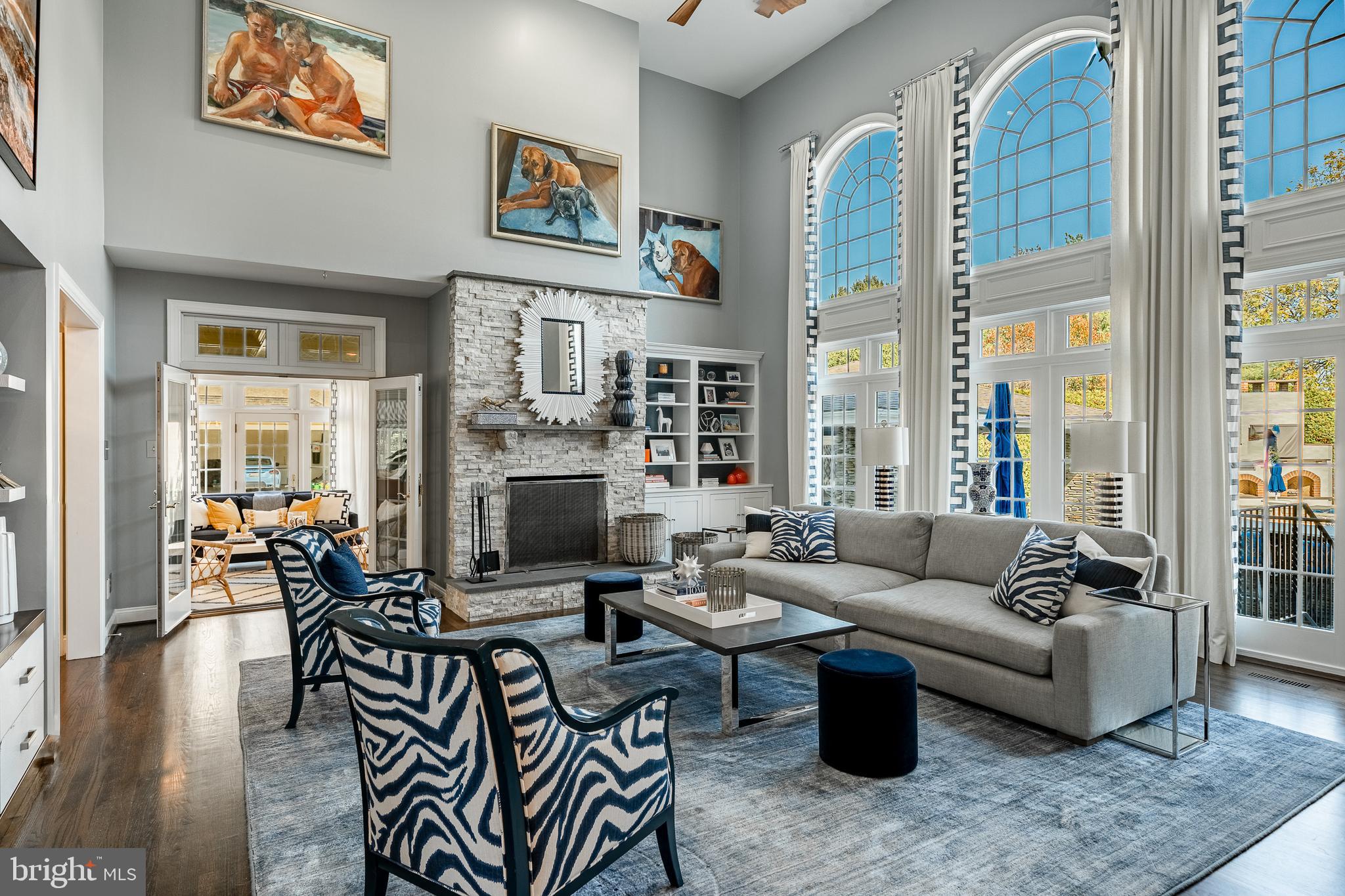 1053 Whitegate Road Wayne, PA 19087 - Photo 6 of 51 a living room with fireplace furniture and a flat screen tv