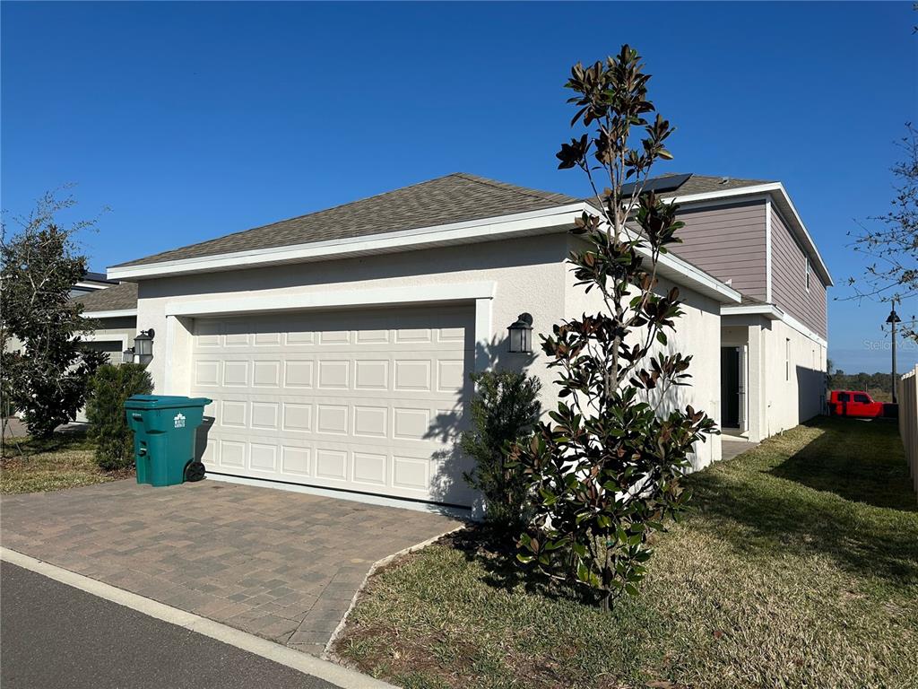 17136 Salty Dog Road Winter Garden, FL 34787 - Photo 31 of 38 a front view of a house with a yard