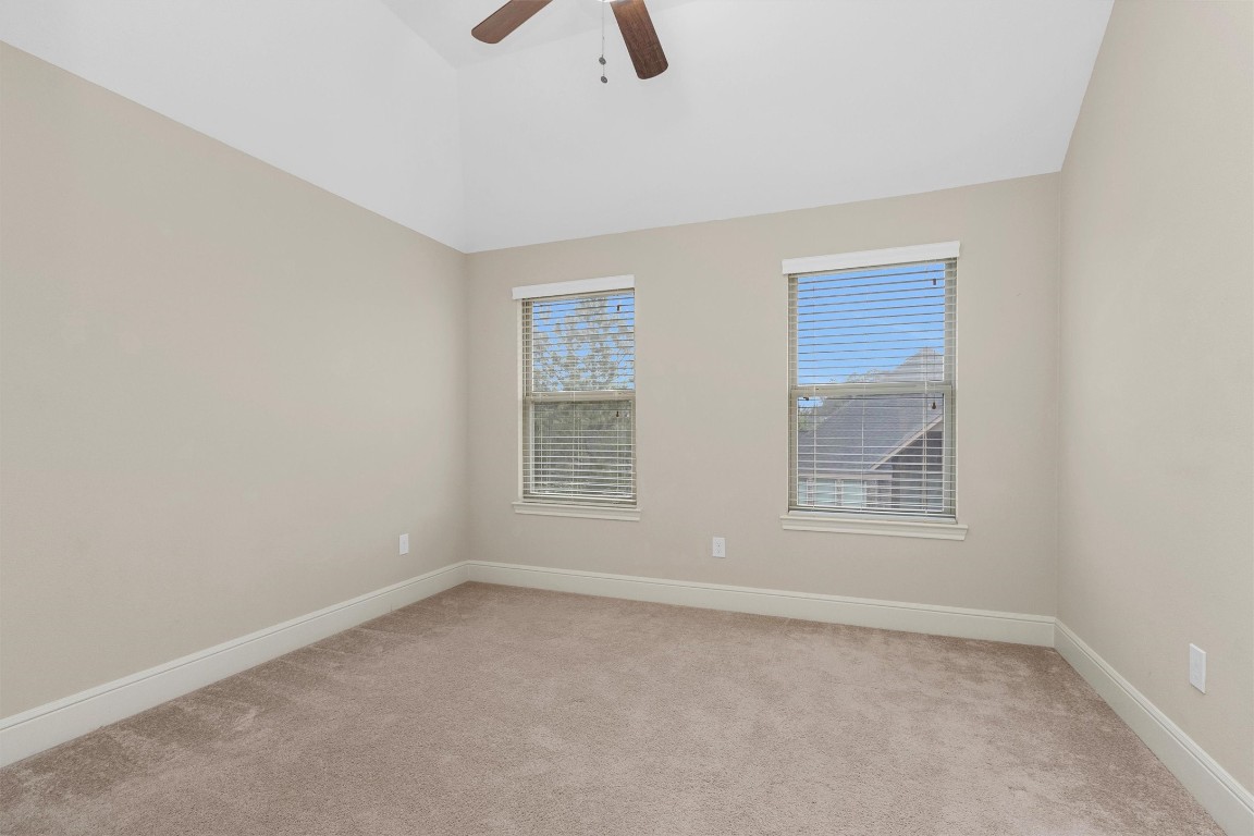 17203 Prairie Falcon Lane Conroe, TX 77385 - Photo 23 of 30 an empty room with windows