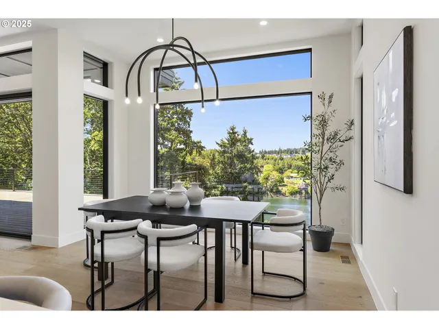 a view of a dining room with furniture and window