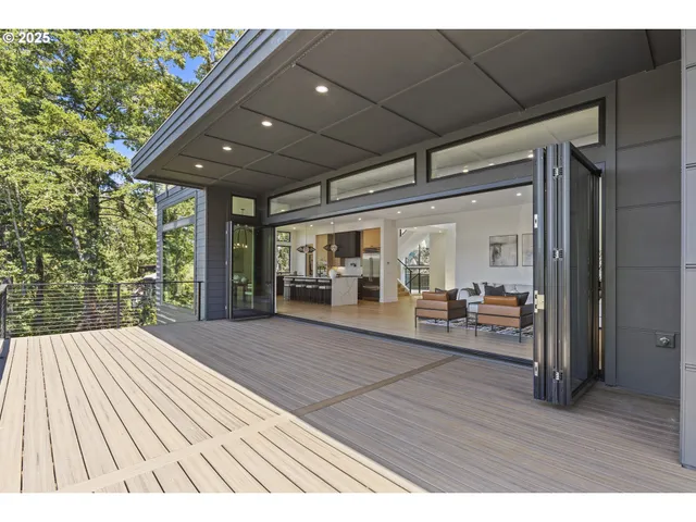 a view of swimming pool with seating space