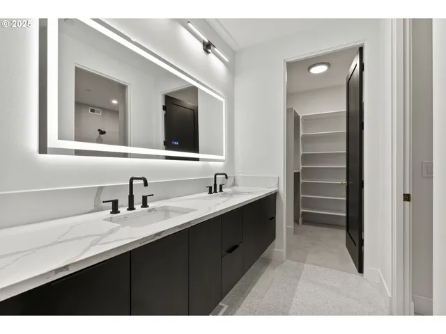 a bathroom with a sink and a bathtub