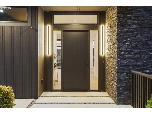 a view of entryway with a wooden door