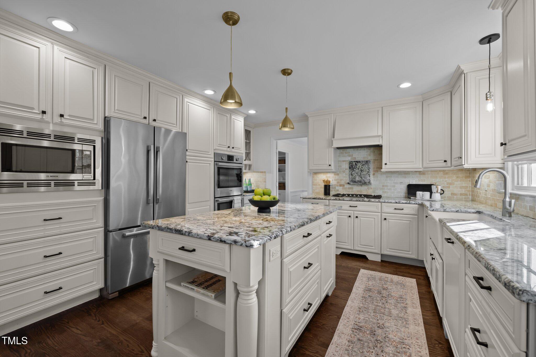 3930 St Marks Road Durham, NC 27707 - Photo 13 of 41 a kitchen with a sink stove and refrigerator