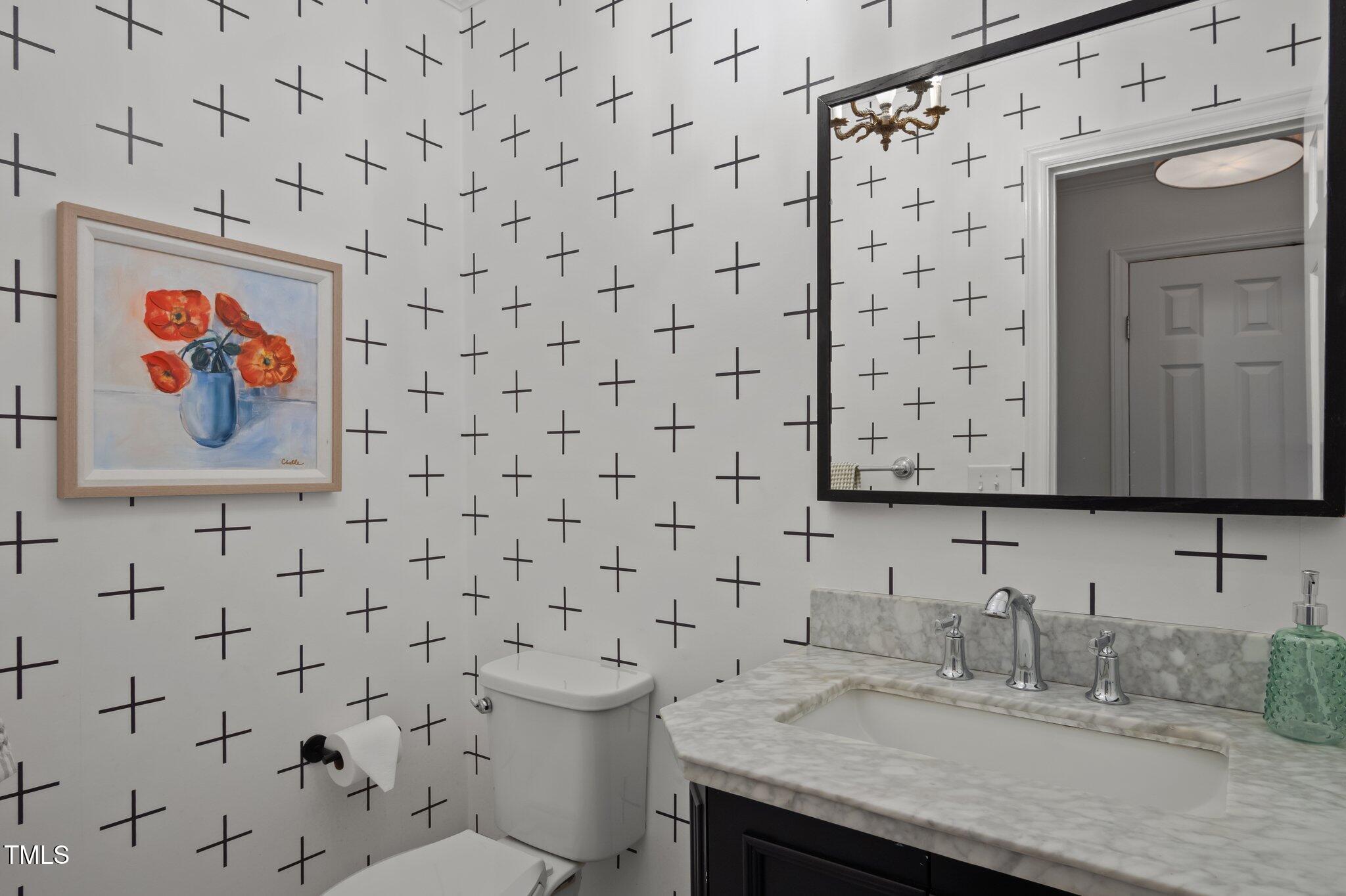 3930 St Marks Road Durham, NC 27707 - Photo 16 of 41 a bathroom with a granite countertop sink and a toilet