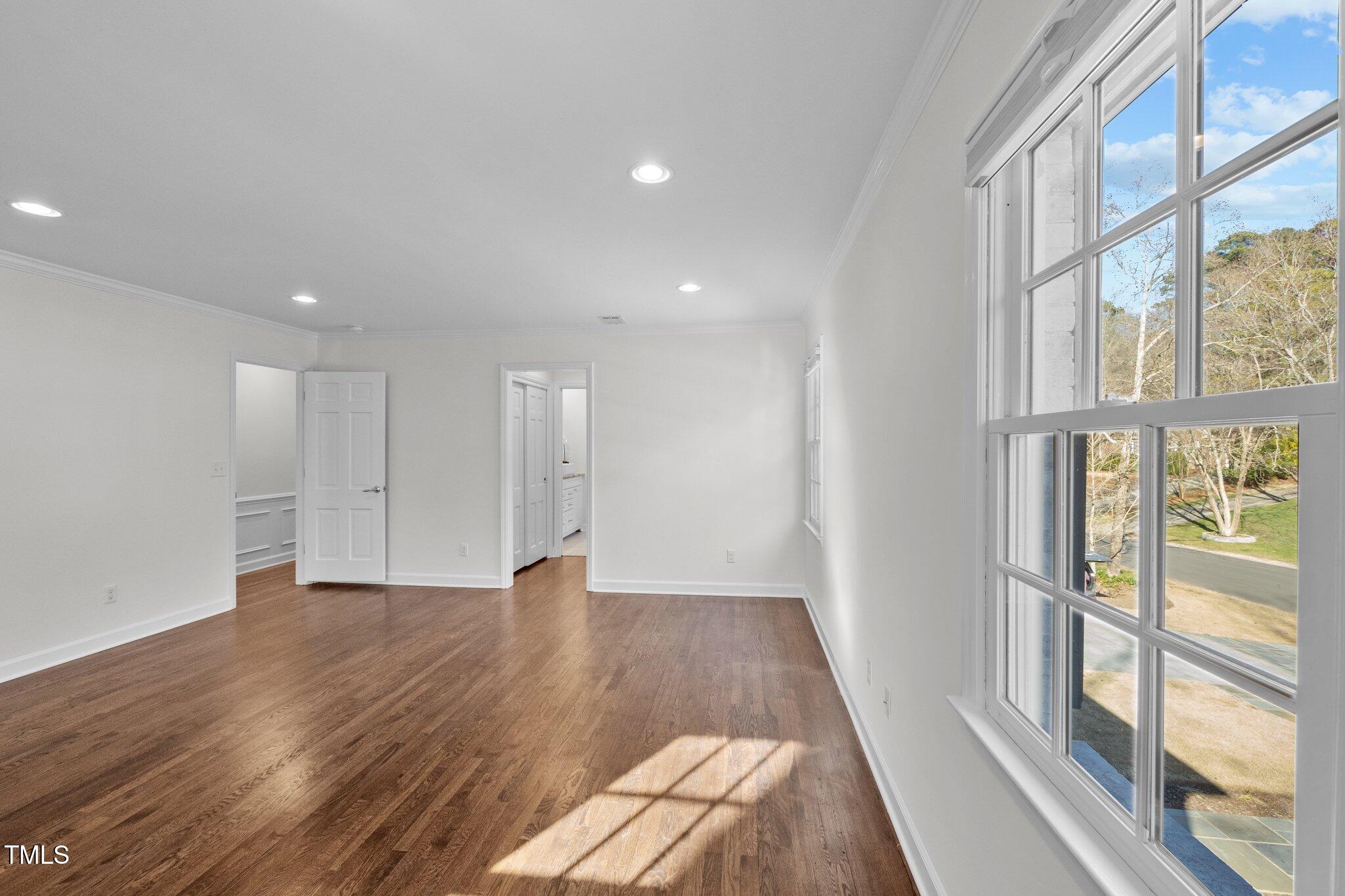 3930 St Marks Road Durham, NC 27707 - Photo 20 of 41 a view of an empty room with a window