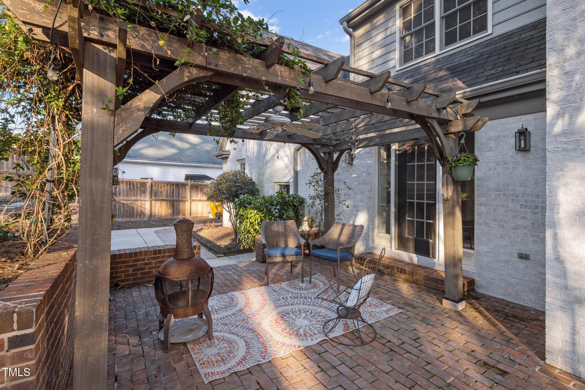 3930 St Marks Road Durham, NC 27707 - Photo 32 of 41 a view of a chairs and table in a patio