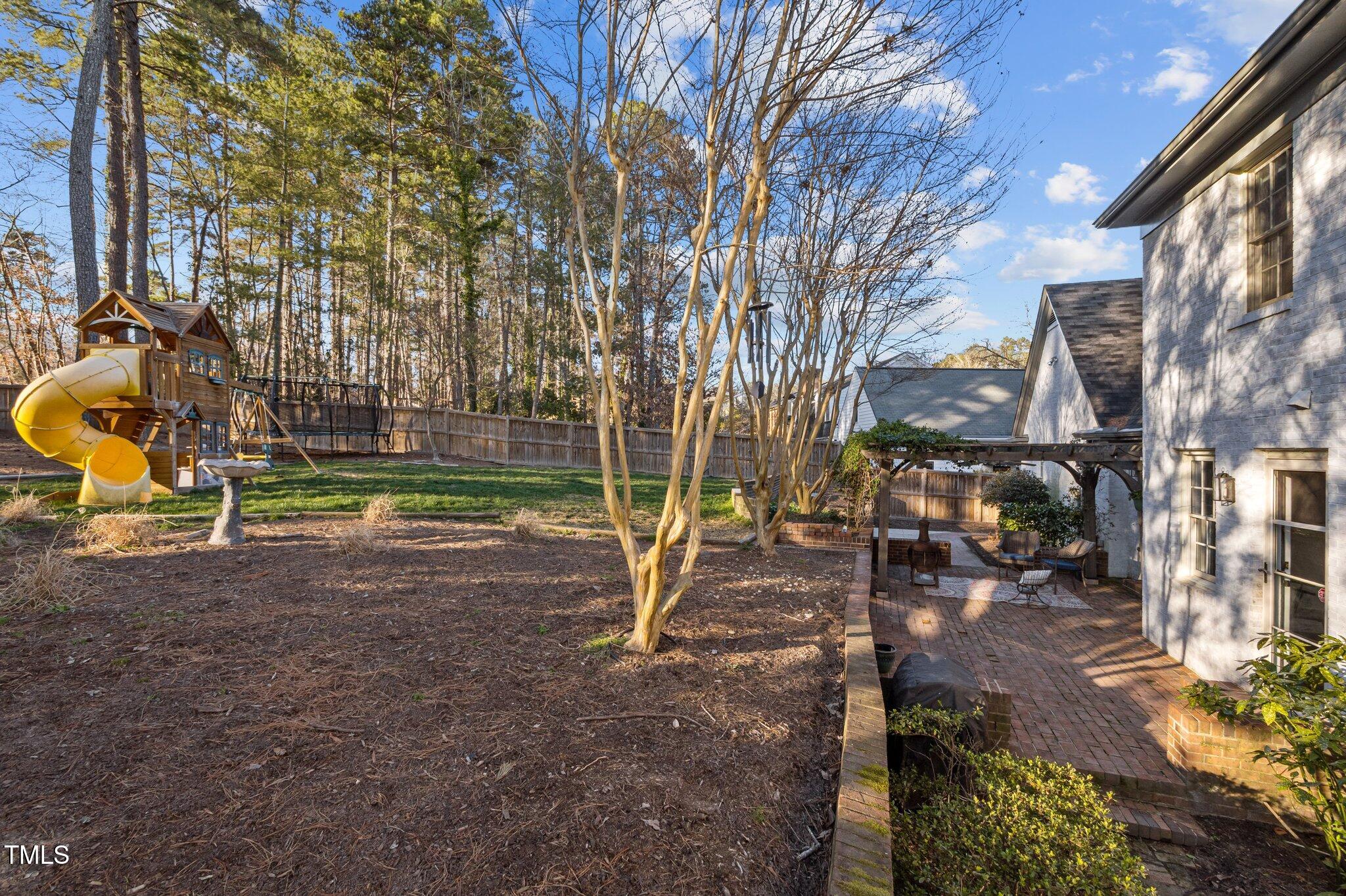 3930 St Marks Road Durham, NC 27707 - Photo 34 of 41 a view of outdoor space with playground and green space