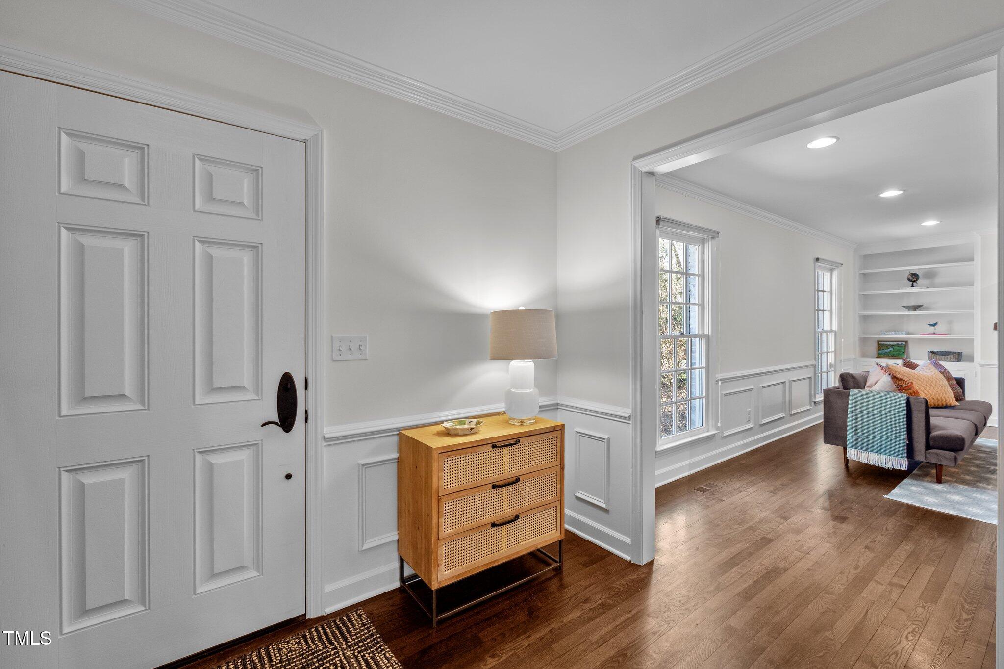 3930 St Marks Road Durham, NC 27707 - Photo 6 of 41 a room with furniture and wooden floor