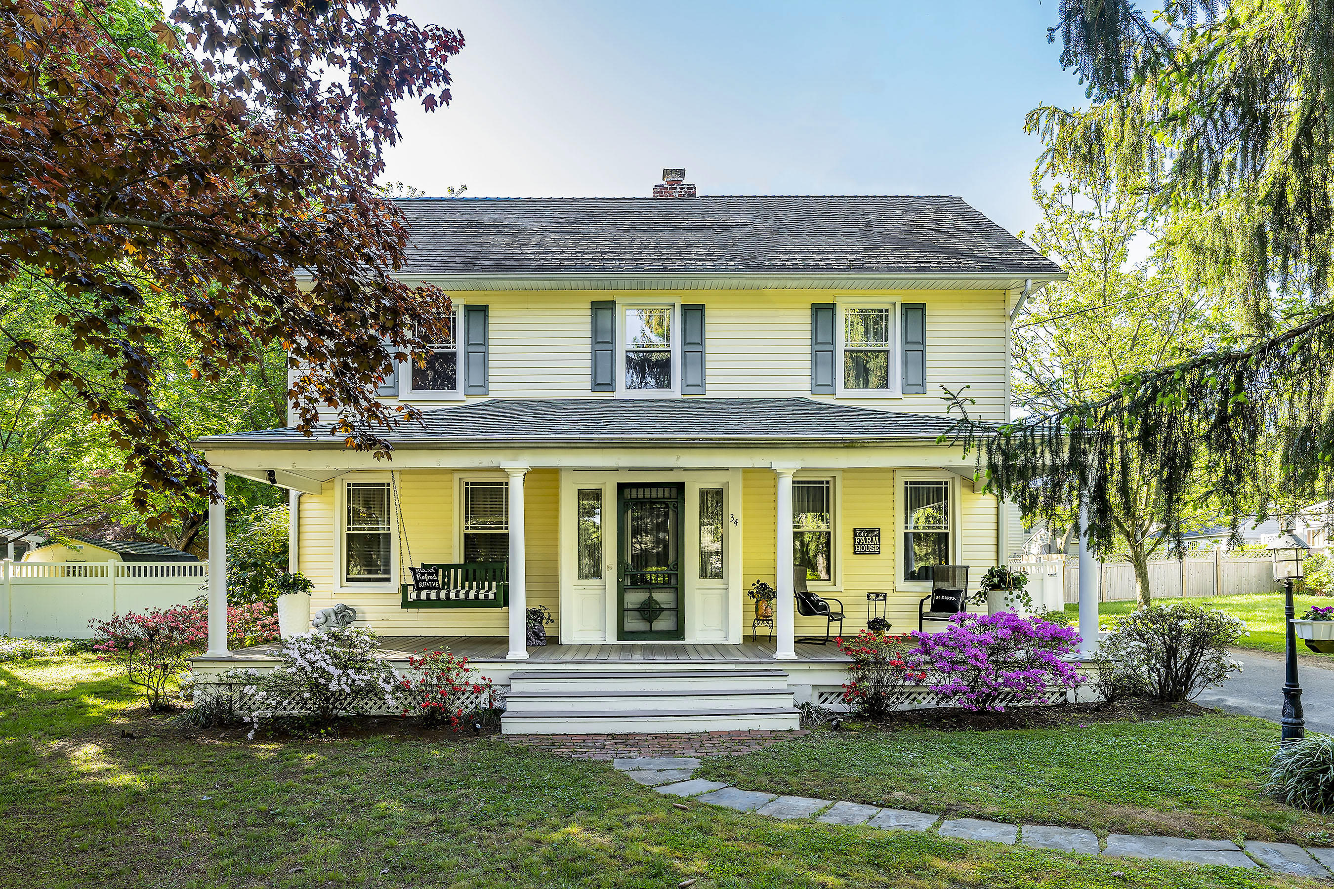 34 Rumson Road Little Silver, NJ 07739 - Photo 1 of 29 a front view of a house with garden