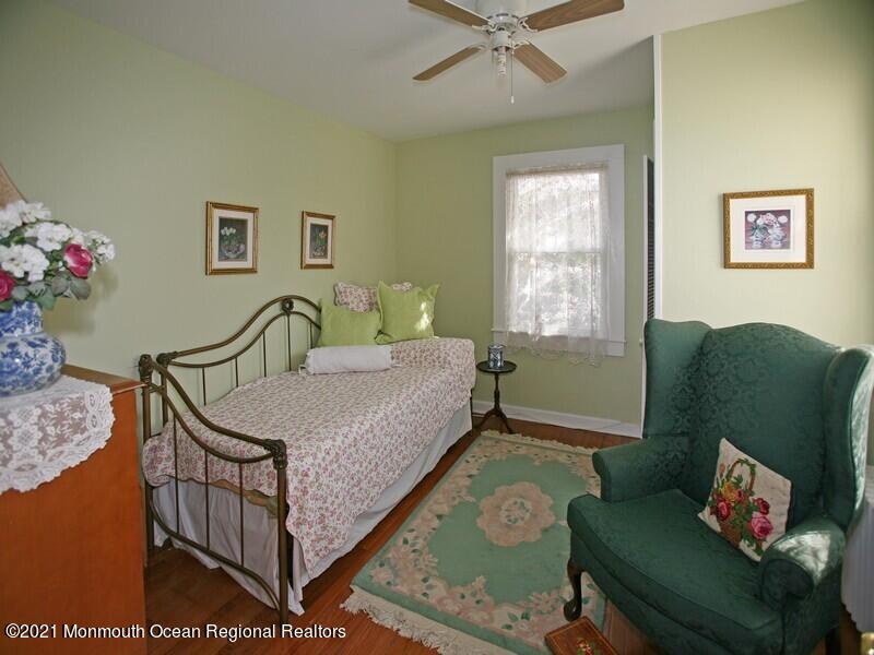 34 Rumson Road Little Silver, NJ 07739 - Photo 17 of 29 a bedroom with furniture and a window