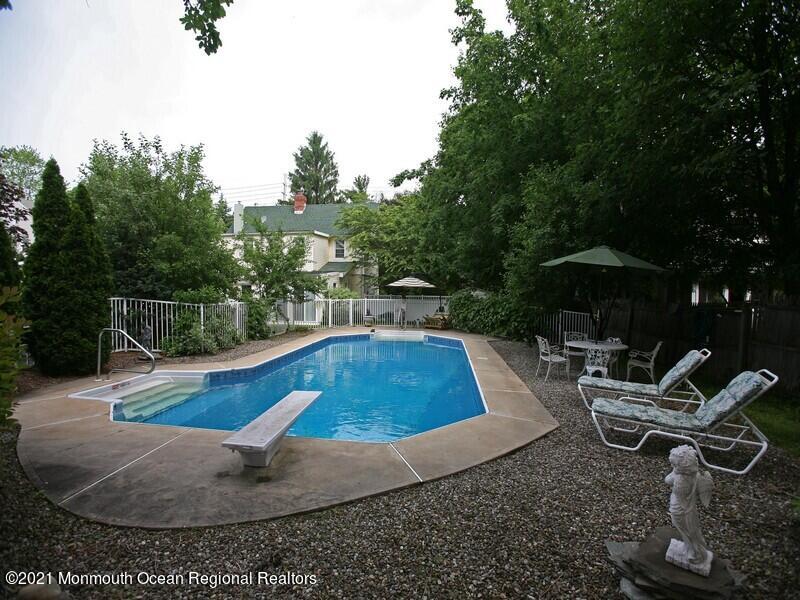 34 Rumson Road Little Silver, NJ 07739 - Photo 22 of 29 a view of a swimming pool with sitting area