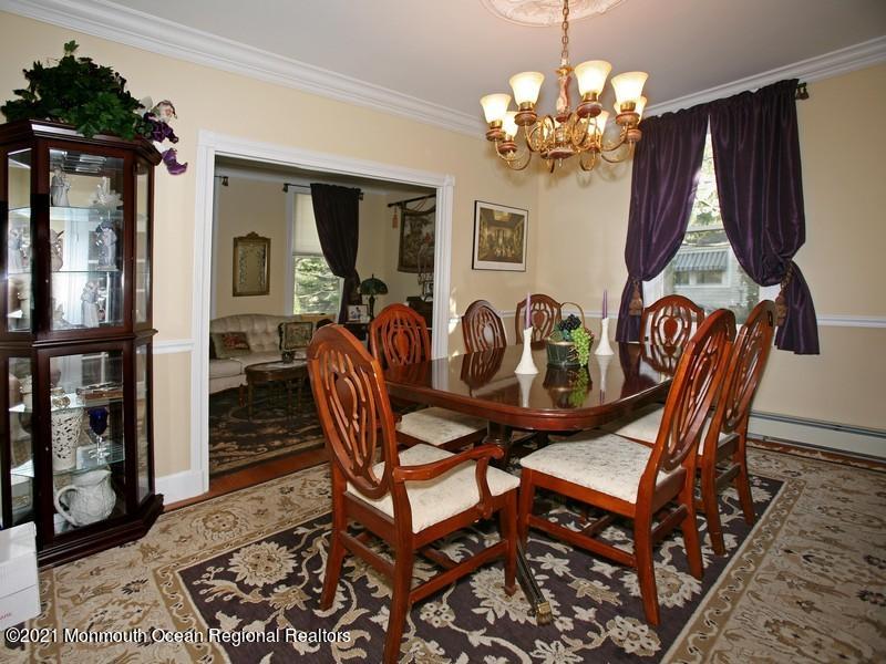 34 Rumson Road Little Silver, NJ 07739 - Photo 8 of 29 a dining room with furniture a chandelier and window