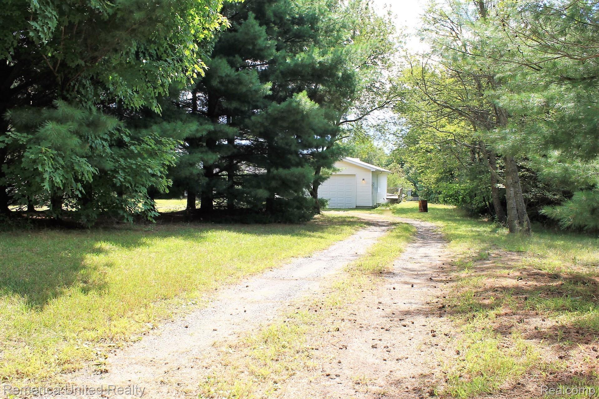 2007 Gannon Road Howell, MI 48855 - Photo 3 of 93 WebbRealtyPros_2007Gannon_ExteriorWestDrive.JPG